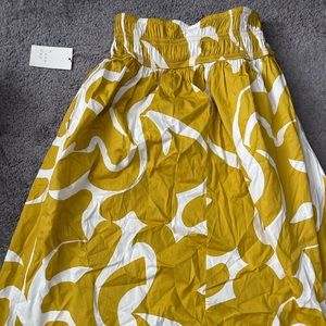 A New Day knee length skirt. Never worn. Tags still attached.
